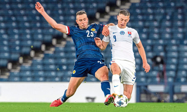 Andy Considine playing for Scotland against Slovakia.