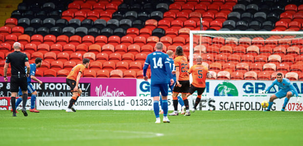 Steven Boyd netting Peterhead's winner at Tannadice.
