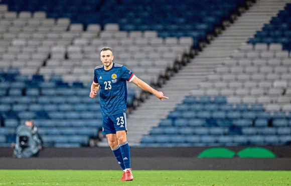 Andy Considine in action for Scotland.