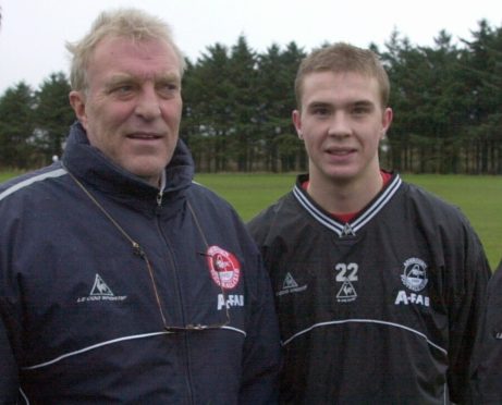 Former Aberdee manager Ebbe Skovdahl with Darren Mackie.