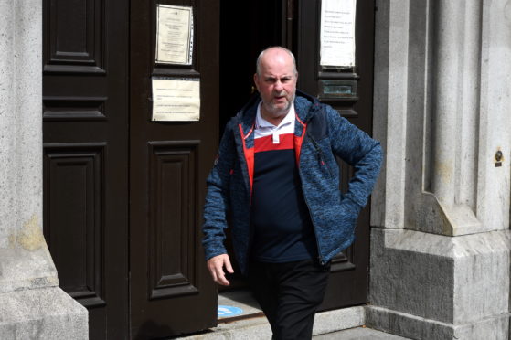 Gordon Cameron leaving court.