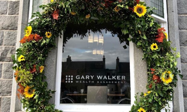 The horseshoe outside of the Gary Walker Wealth Management