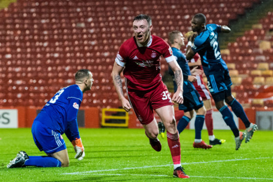Ryan Edmondson celebrates his second and Aberdeen's fourth goal against Hamilton. The Dons were potent against Accies.