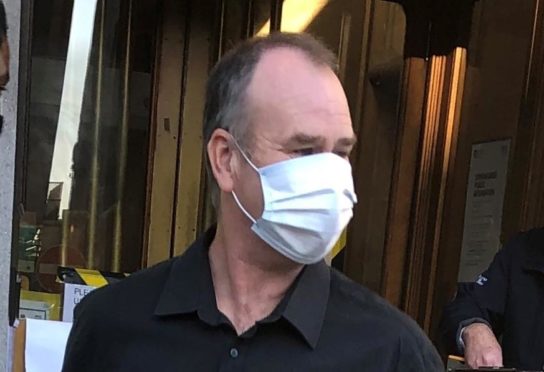 Gary Alexander leaving court.