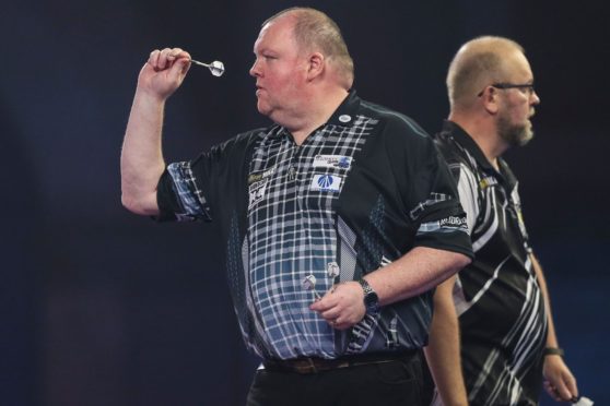 John Henderson in action against marko Kantele. Photo by Shane Healey/ProSports/Shutterstock