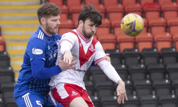 Gary MacKenzie, left, in action for Peterhead.
