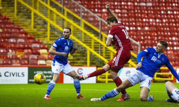 Aberdeen's Ash Taylor (centre) makes it 2-1 against St Johnstone.