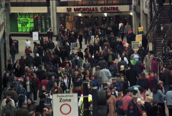 1996: Shop till you drop the hectic scene outside the St Nicholas Centre in Aberdeen yesterday.