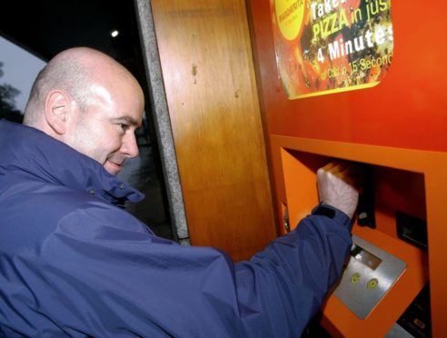 Scott Begbie at the pizza vending machine in 2004.