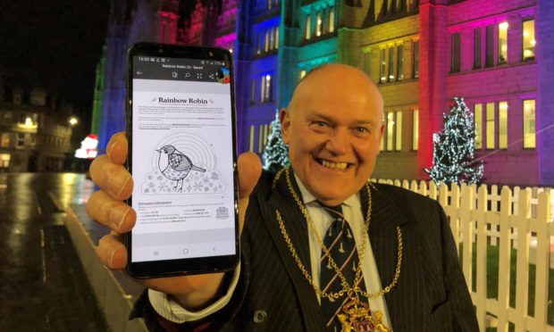 Lord Provost Barney Crockett with the Rainbow Robin.