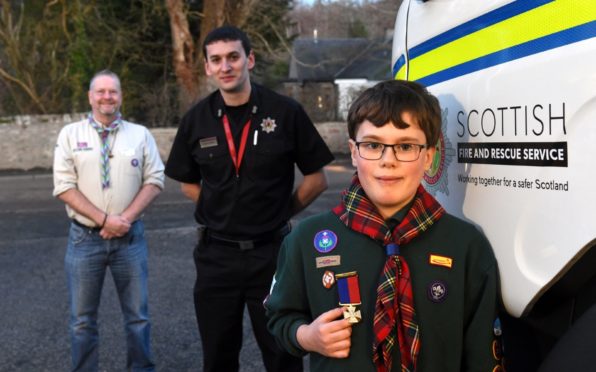 Dougie Simmers, Scouts regional commander for North East, Stewart Murray, watch commander and Cameron Barnes.