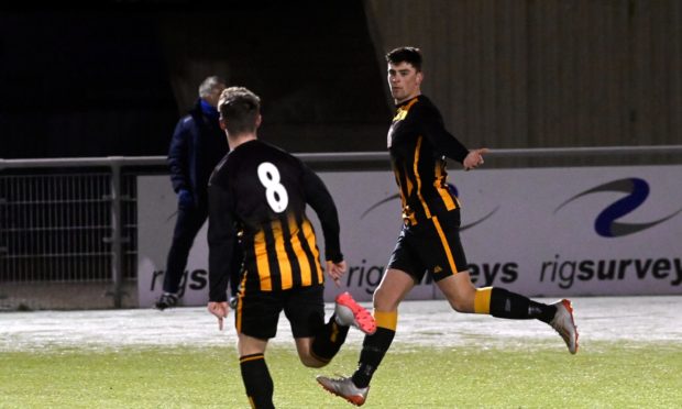 Glenn Murison, right, celebrates his equaliser for Huntly