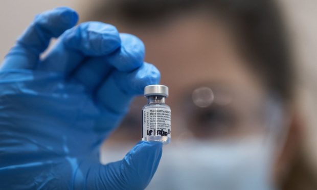 A phial of the Pfizer/BioNTech COVID-19 vaccine