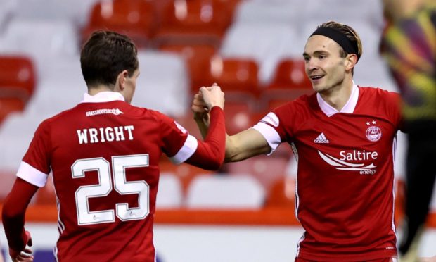 Aberdeen's Ryan Hedges (right) celebrates scoring his side's third goal of the game with teammate Scott Wright in the 6-0 defeat of Runavik.