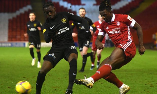 Greg Leigh of Aberdeen (R) in action with Livingston's Steve Lawson