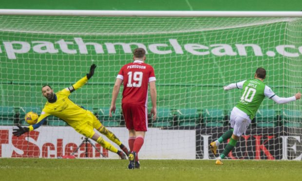 Hibernian's Martin Boyle makes it 1-0 from the penalty spot against Aberdeen.