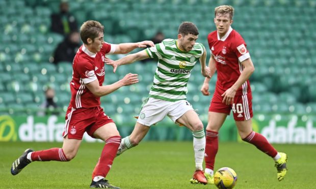 Celtic's Ryan Christie and Aberdeen midfielder Dean Campbell in action on Saturday.
