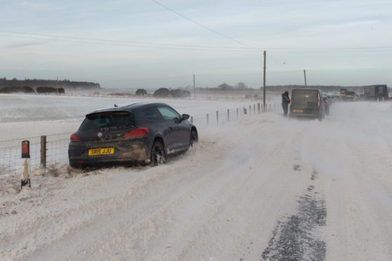 Snowy hills next to the A96 at Huntly. Picture by Chris Sumner