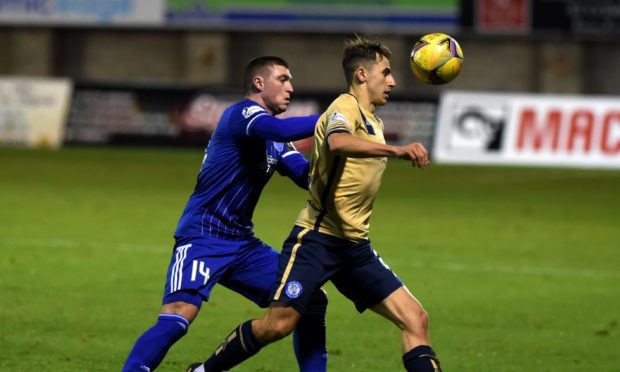 Gary Fraser, left, in action for Peterhead
