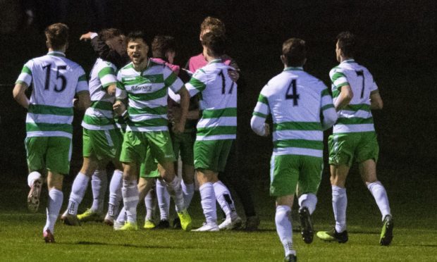 The Buckie Thistle players celebrate Callum Murray's goal against Inverness.