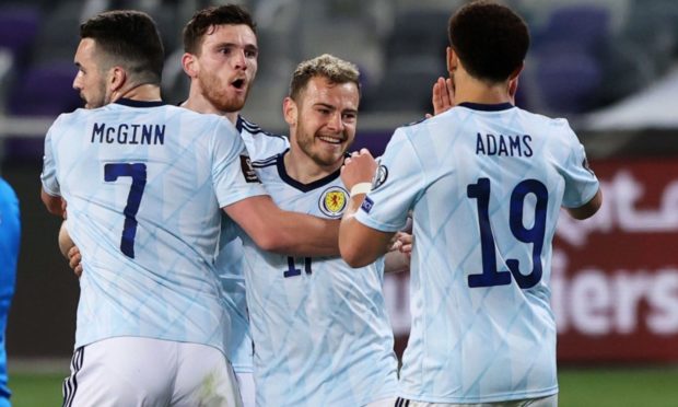 Scotland's Ryan Fraser (centre) celebrates his equaliser against Israel.