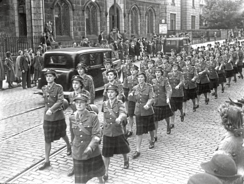 1941: Pictured are the Auxiliary Territorial Service on march. Picture taken in 1941.