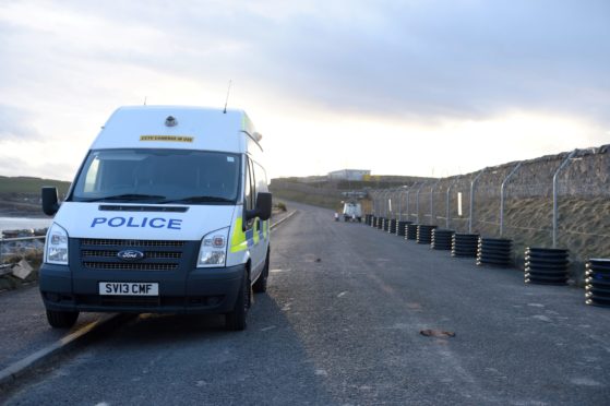 Police at the Aberdeen Harbour site.