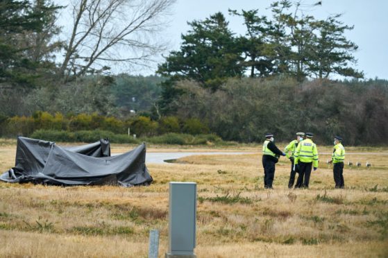 Police remain on site of Kinloss Barracks where a body has been found.