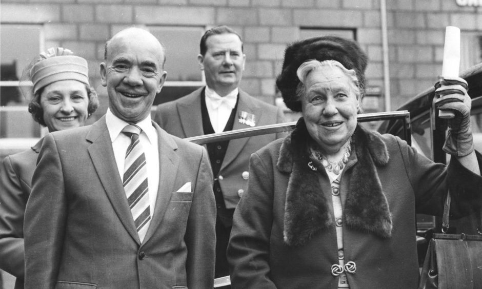 Mary Esslemont 1981-10-09 Dr Mary Esslemont proudly waves the scroll presented to her by Lord Provost Alex Collie when he conferred on her the Freedom of the City.