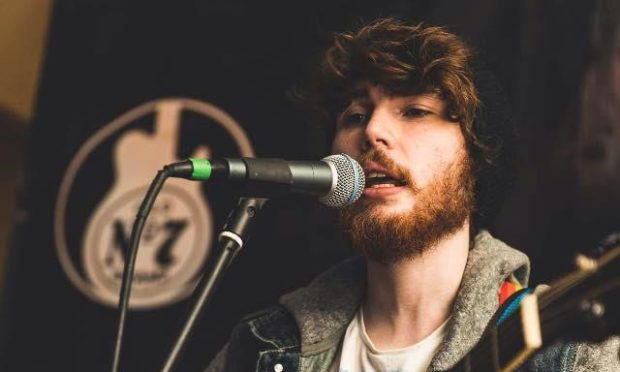 Aberdeen musician Stephen Mackintosh performing at the Bridge Street Social Club.