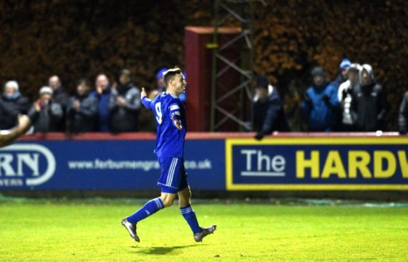 Cove's Mitch Megginson celebrating after scoring against Brechin City.