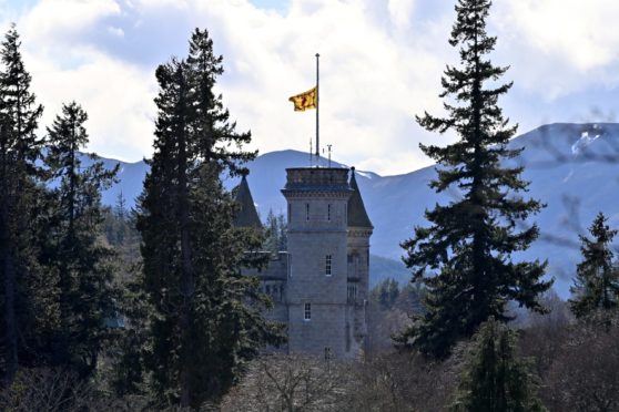 Balmoral Castle flying the Flag at half mast