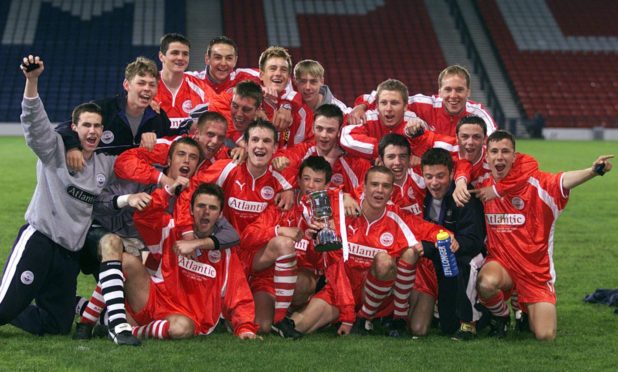 The victorious Aberdeen team celebrate after defeating Celtic 2-0 in the 2001 Scottish Youth Cup final
