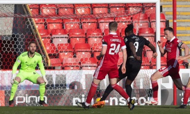 Jay Emmanuel-Thomas scores to make it 1-0 Livingston during a Scottish Cup against Aberdeen.