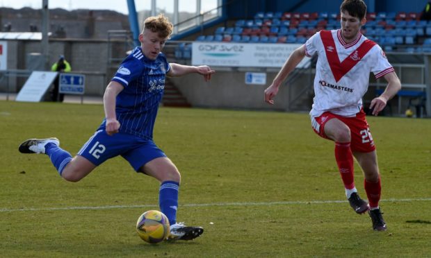 Andrew McCarthy, left, is staying with Peterhead.