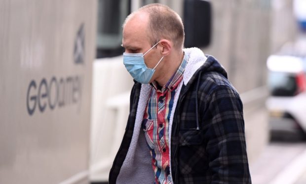 Michael Tonberg leaving court.
