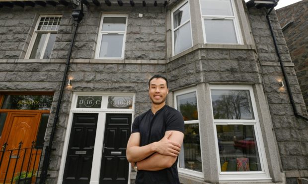 Property developer Jonathan Lau has transformed an old guesthouse into luxury apartments.