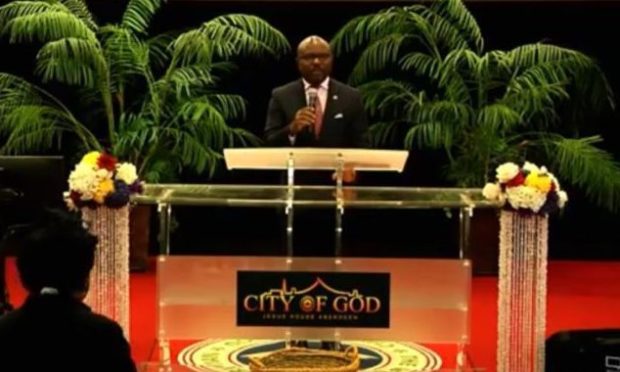 City Of God Pastor Joe Ochei preaching at the Holburn Street church, which is streaming services due to Covid.