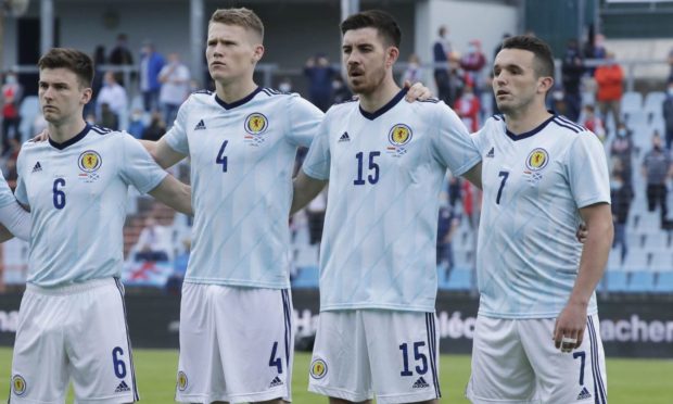 Declan Gallagher, third from left, lines up ahead of the friendly against Luxembourg alongside Kieran Tierney, Scott McTominay and John McGinn.
