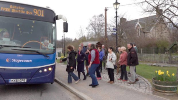 Braemar residents boarding 901 Sunday service between Ballater and Braemar in 2019.