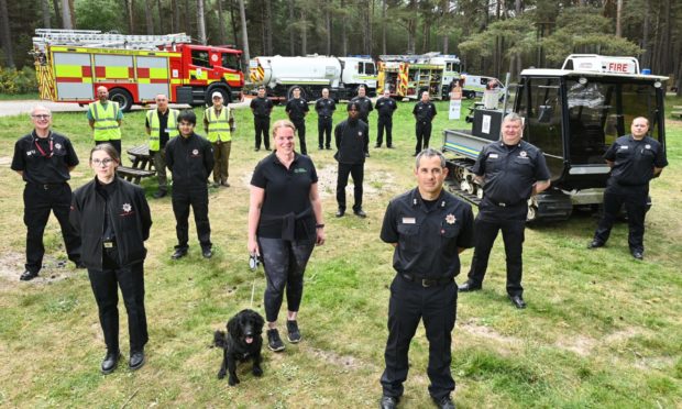 Front L2R - Fiona Robertson (Area Visitor Manager) with dog Harris, Gareth Luce (Watch Commander) and Ewen McIntosh (Watch Commander Rural Support).
Pictures by JASON HEDGES