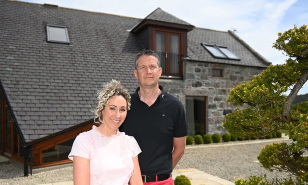 Teresa and John Anderson outside Ard Na Moy, at Glassel, Banchory.