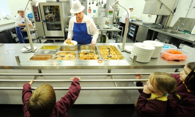 Serving school lunch