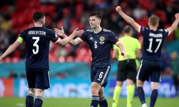 Scotland's Andrew Robertson (left) and Kieran Tierney react after the UEFA Euro 2020 Group D match at Wembley.