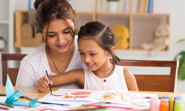 Positive parenting focuses on your child’s wish to please you, as well as the importance of listening and showing love