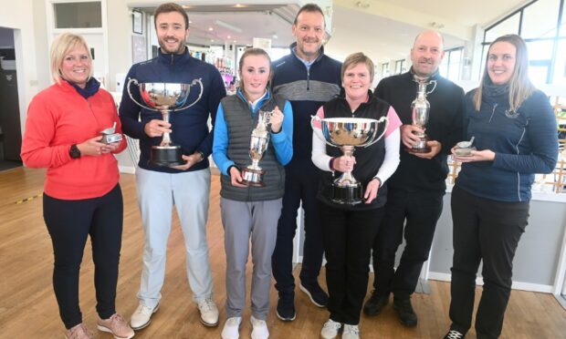 Evening Express Champion of Champions finals winners: Peter Mutch, centre from Aberdein Considine with the winners and runner's up from left, Marie McCallum, Adam Dunton, Emma Logie, Julie Henderson, Michael Laird and Kelly Guthrie.