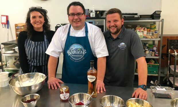 From left: Julia Bryce with Stuart Donald and Calum Lockerbie.