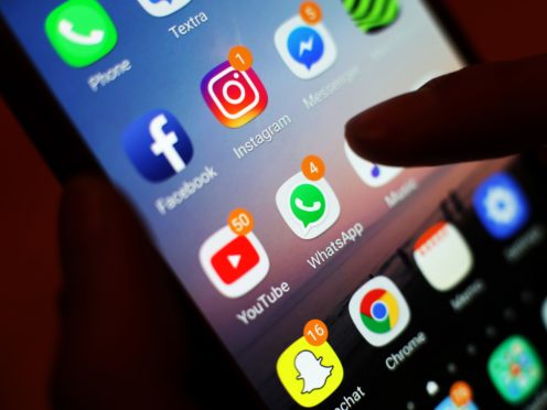 Facebook wants to make it easier to reach friends and family across networks (Yui Mok/PA)