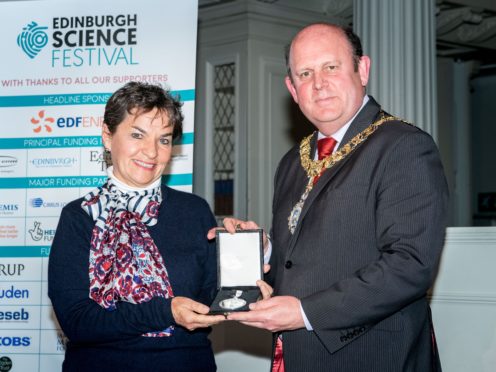 Lord Provost Frank Ross presents Christiana Figueres with the Edinburgh Medal (Ian Georgeson/PA)