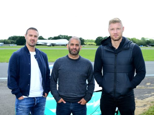 Paddy McGuinness, Chris Harris and Freddie Flintoff with a McLaren 600LT on the Top Gear test track (Ian West/PA)